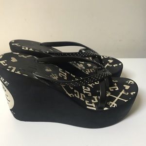 2/$20 Juicy Couture black wedge sandals.. size 9